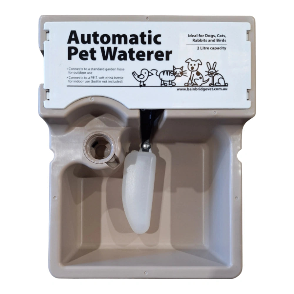 Automatic pet waterer with float sitting in the bowl with a label on a white background