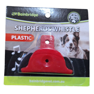 Red shepherd's whistle in packaging with Bainbridge branding and a dog image.