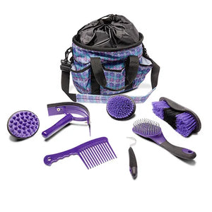 Set of grooming tools with a patterned bag on a white background