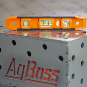 Orange level on a metal surface with 'AgBoss' branding.