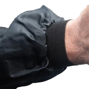 Grey sleeve with a textured black elastic cuff on a white background