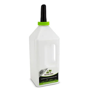 Clear bottle with black cap and green label on a white background