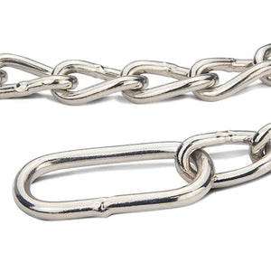 Close-up of a silver chain on a white background