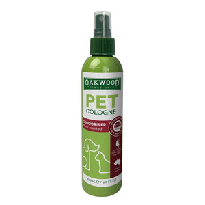 Green bottle of Oakwood Pet Cologne on a white background