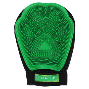 Green grooming mitt with textured surface on a white background, featuring the Oakwood brand.