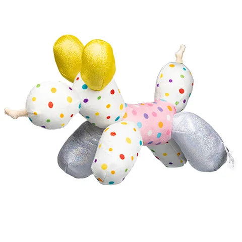 Colorful balloon animal dog toy with polka dots on a white background