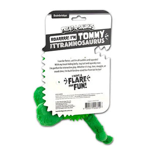 Green dinosaur-shaped toy with packaging on a white background