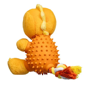 Yellow plush toy with an orange textured body and a red and white tail on a white background