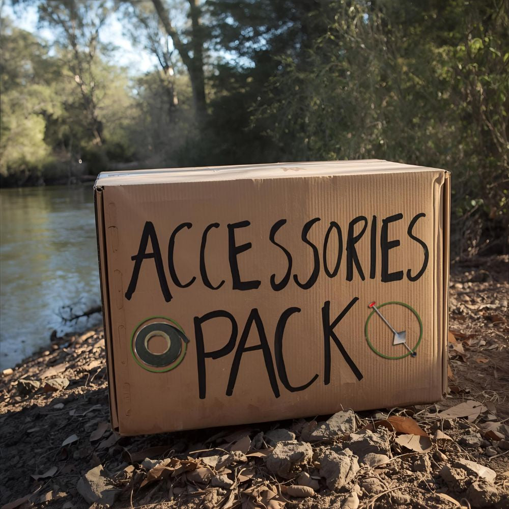 Cardboard box labeled 'Accessories Pack' by a river with trees in the background