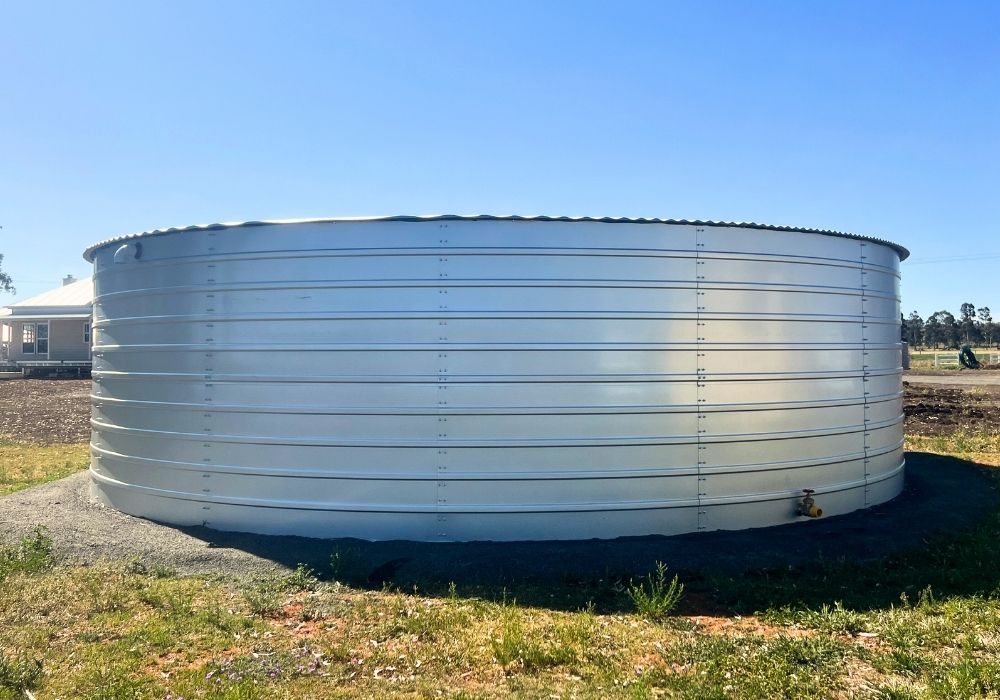 Steel water tank in a field