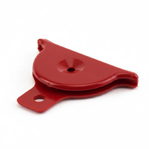 Red plastic shepherd's whistle for dog training on a white background