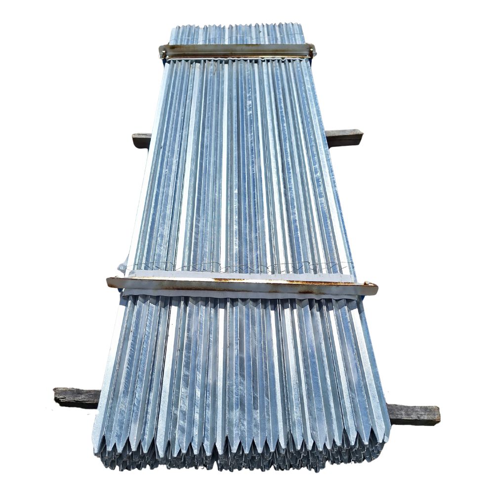 Stack of galvanised metal pickets on a white background