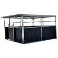 Metal horse stall with black panels on a white background