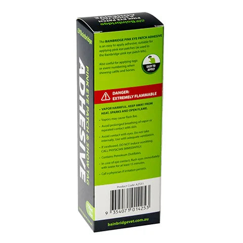 Box of pink-eye patch adhesive with green and black design on a white background