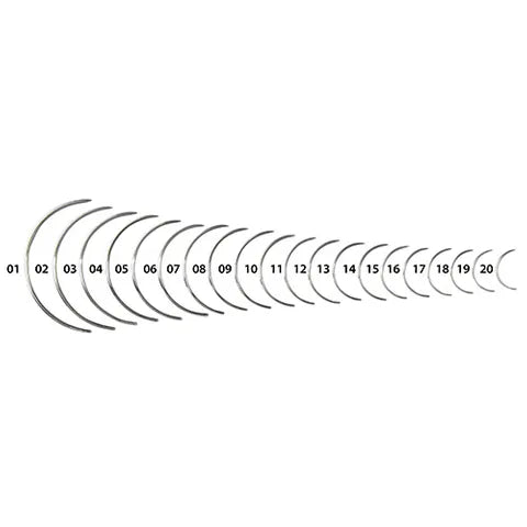Set of 20 suture needles on a white background