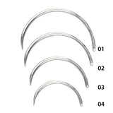 Set of four silver suture needles of different lengths on a white background