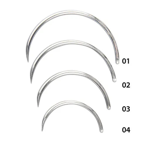 Set of four silver suture needles of different lengths on a white background