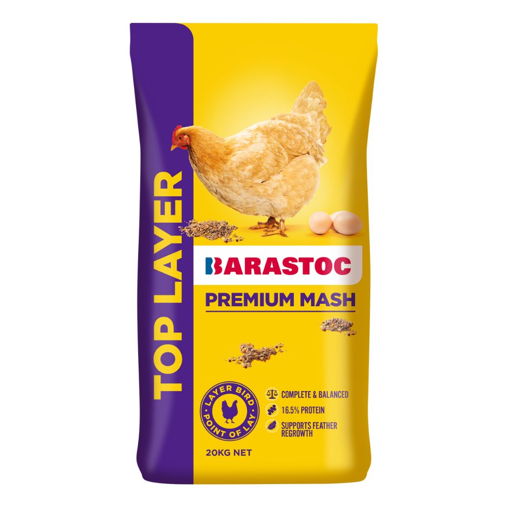 Barastoc Premium Mash Top Layer feed packaging with a chicken and eggs illustration on a yellow and purple background.