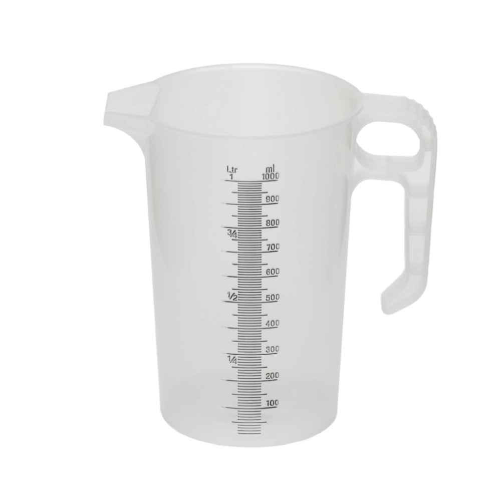 Clear measuring cup with measurement markings on a white background
