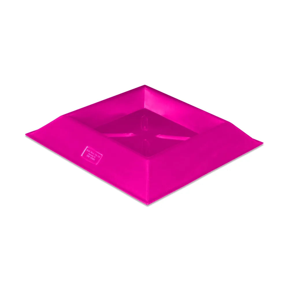 Pink square plastic animal trough on a white background