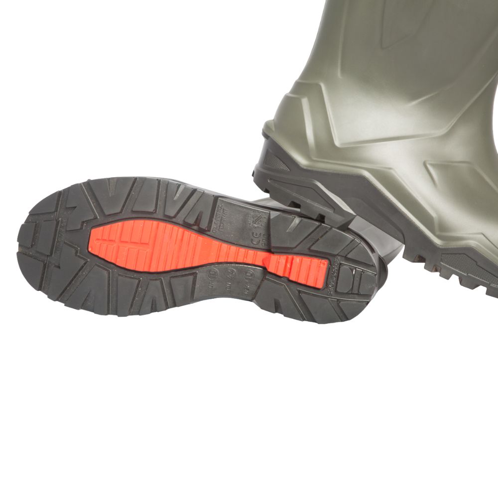 Close-up of a green rubber boot with a black sole featuring red accents on a white background