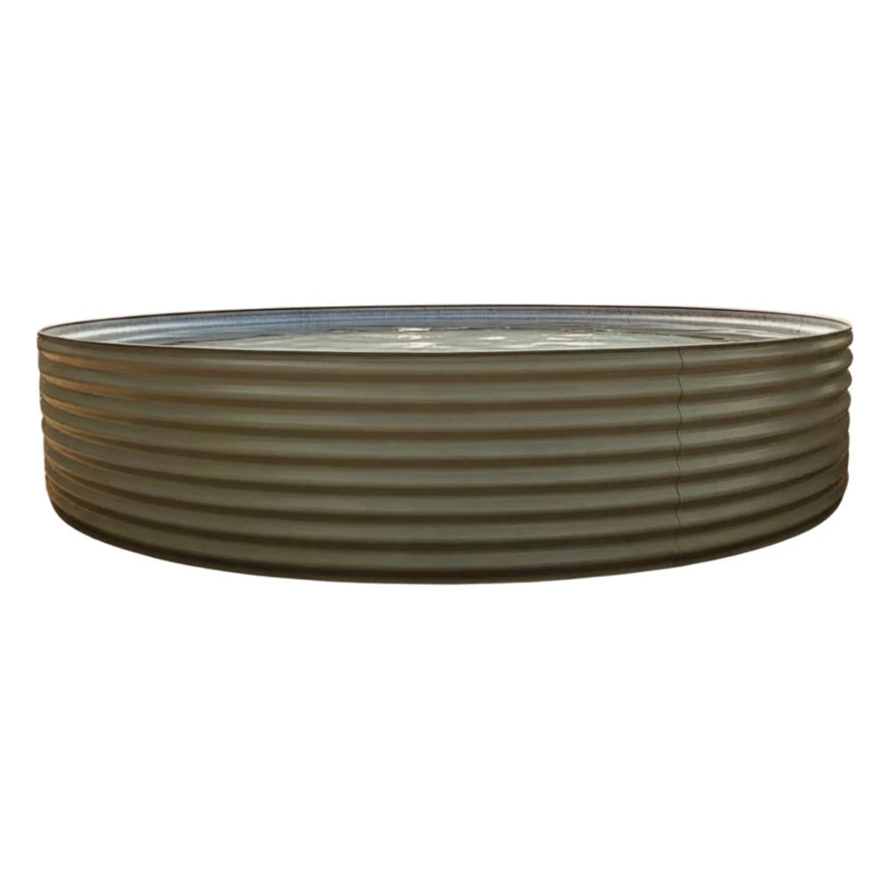 Mist green corrugated round metal plunge pool on a white background