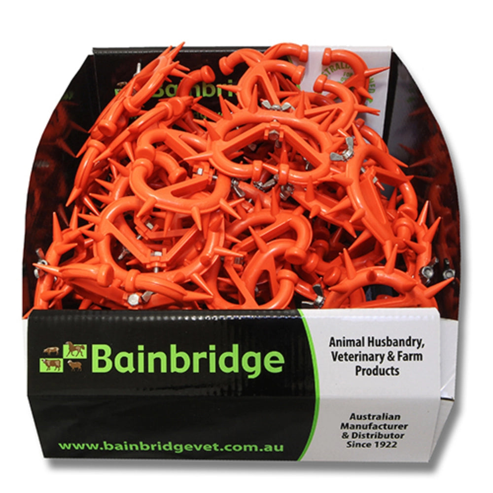 Box of orange animal husbandry calf weaner products with Bainbridge branding.