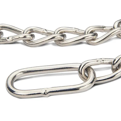 Close-up of a silver chain on a white background
