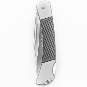 Folding knife with a metallic handle on a white background