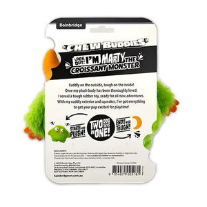 Packaging of a plush toy for dogs, featuring text and branding on a white background.