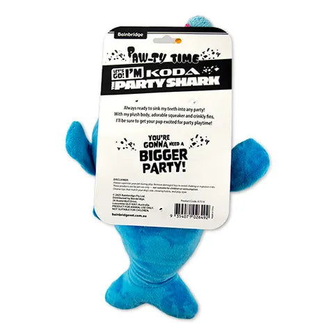 Blue toy shark with packaging on a white background