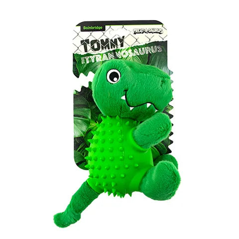 Green dinosaur toy with spiky texture on a white background