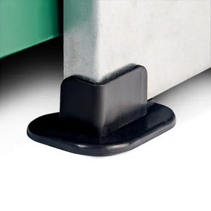 Black plastic leg of a metal and plastic chicken feeder with green top and green treadle platform on a white background