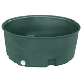 Green plastic water trough on a white background